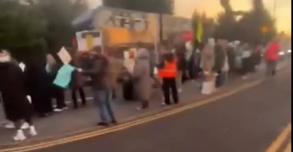 Teachers on strike outside The Royal Sutton School in Sutton Coldfield over planned changes by the Arthur Terry Learning Partnership including a number of compulsory job cuts 