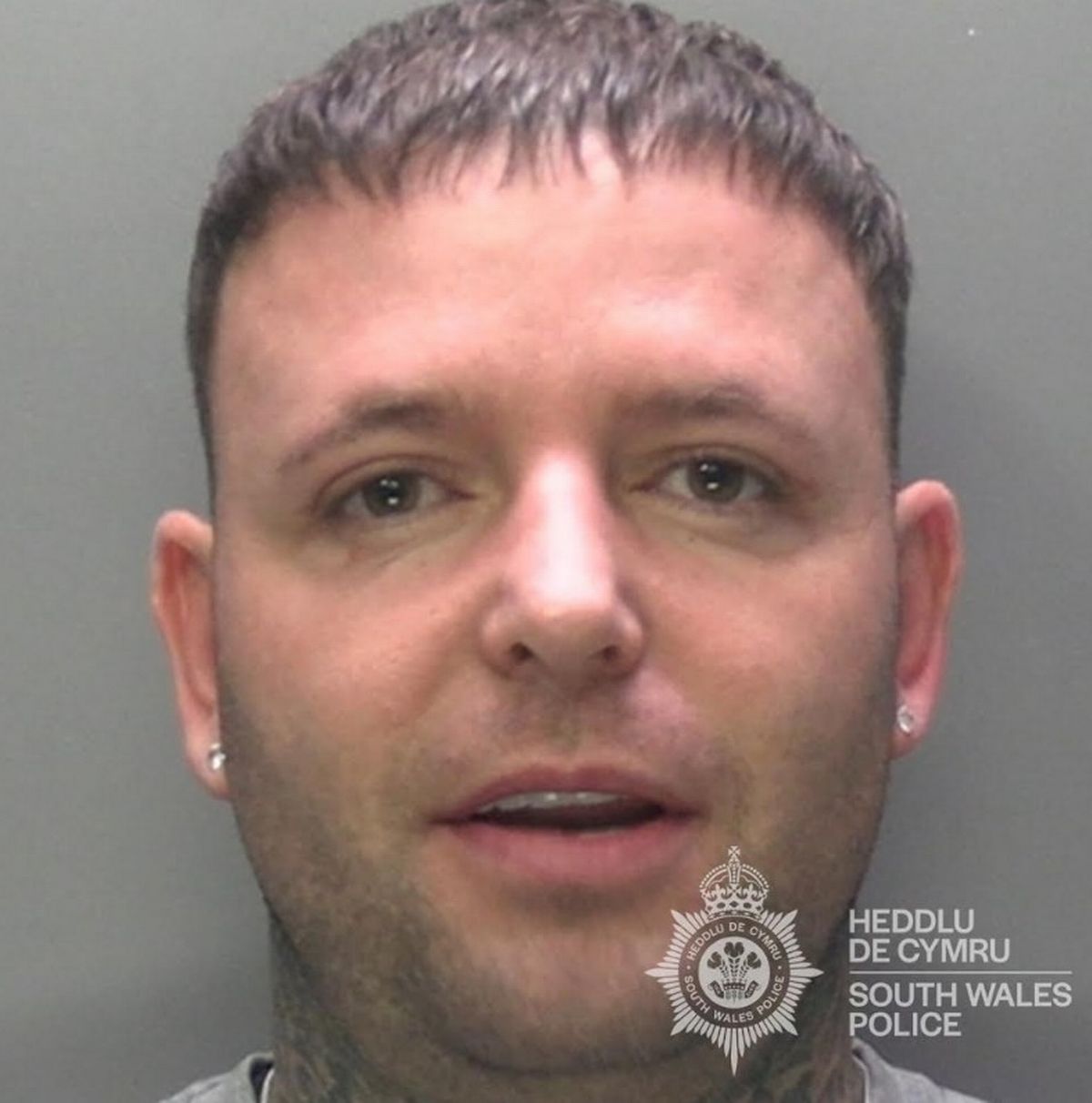 Custody shot of Leon Ley