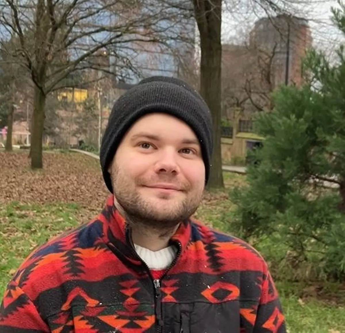 Rugby player interviewed about new years resolutions beside a Manchester park