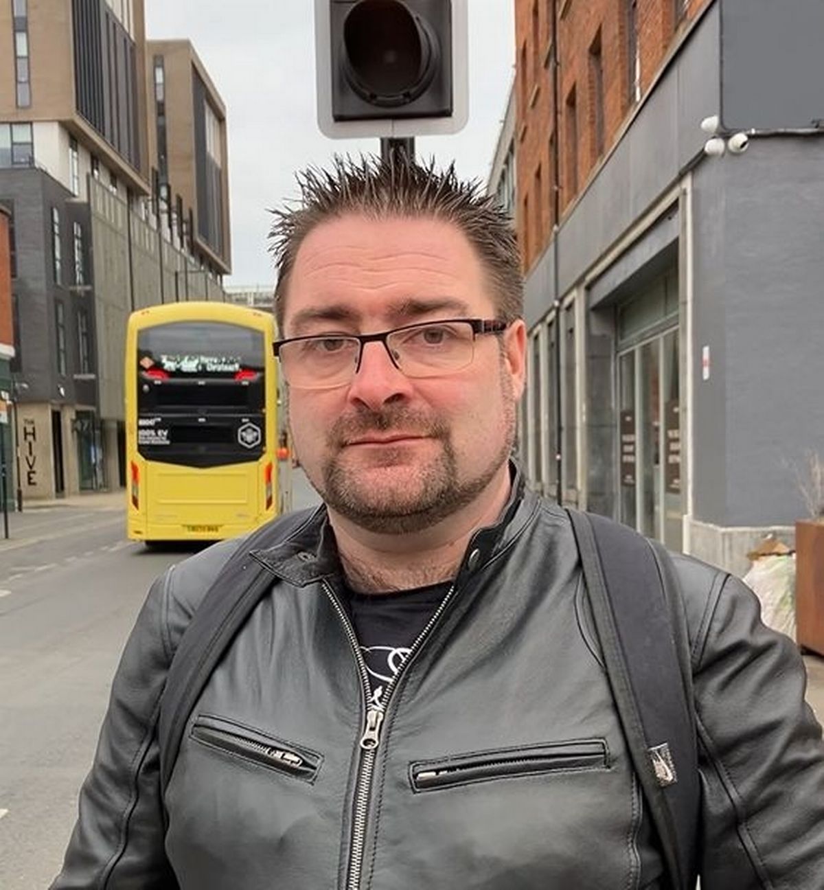 Teacher interviewed about new years resolutions on a Manchester street