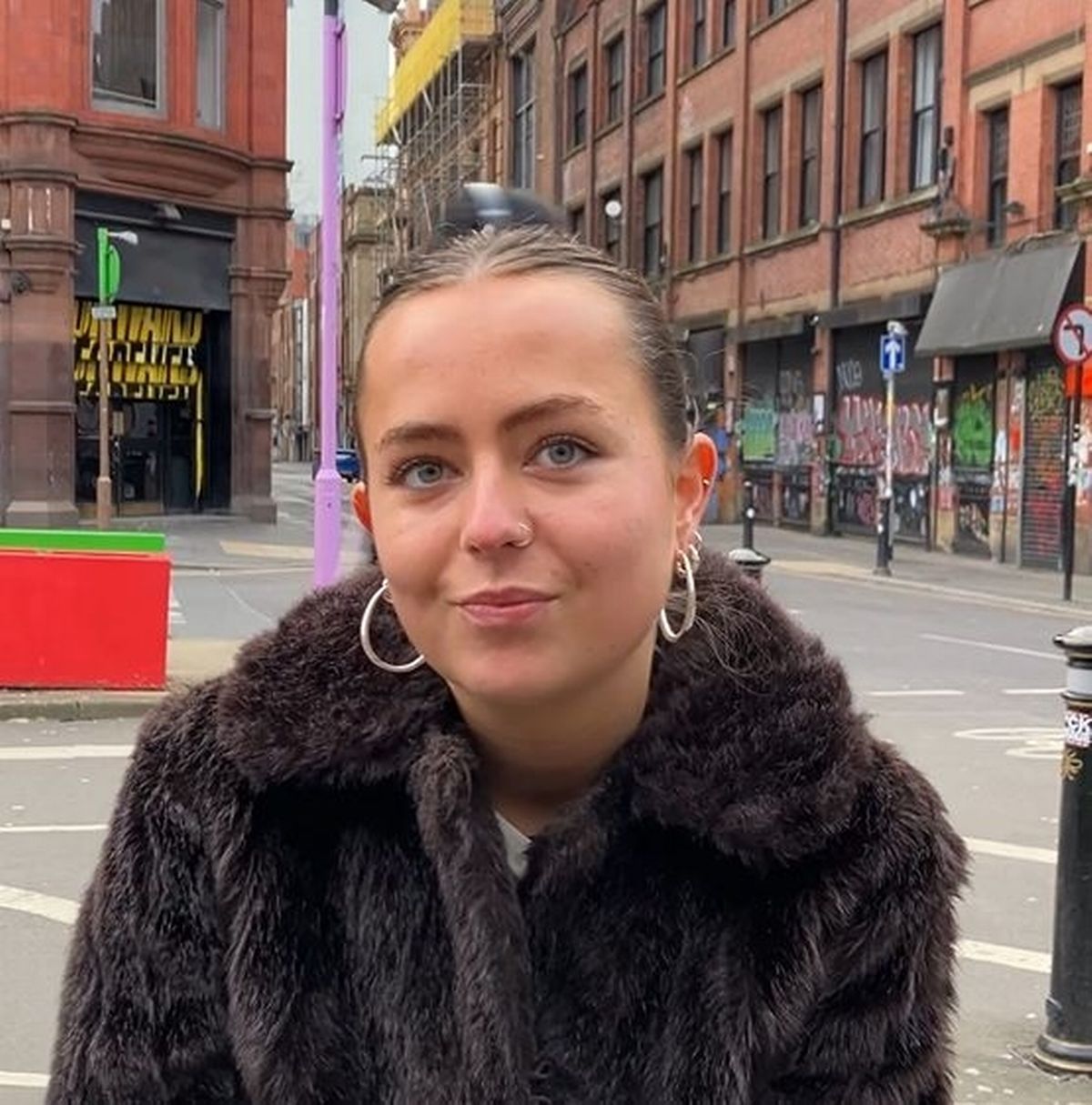 Account manager interviewed about new years resolutions on a Manchester street