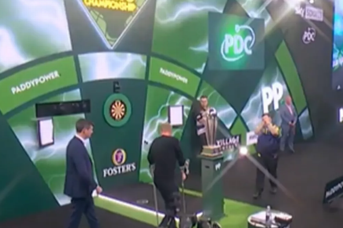 Sir Chris Hoy walked onto the stage on crutches to present the trophy