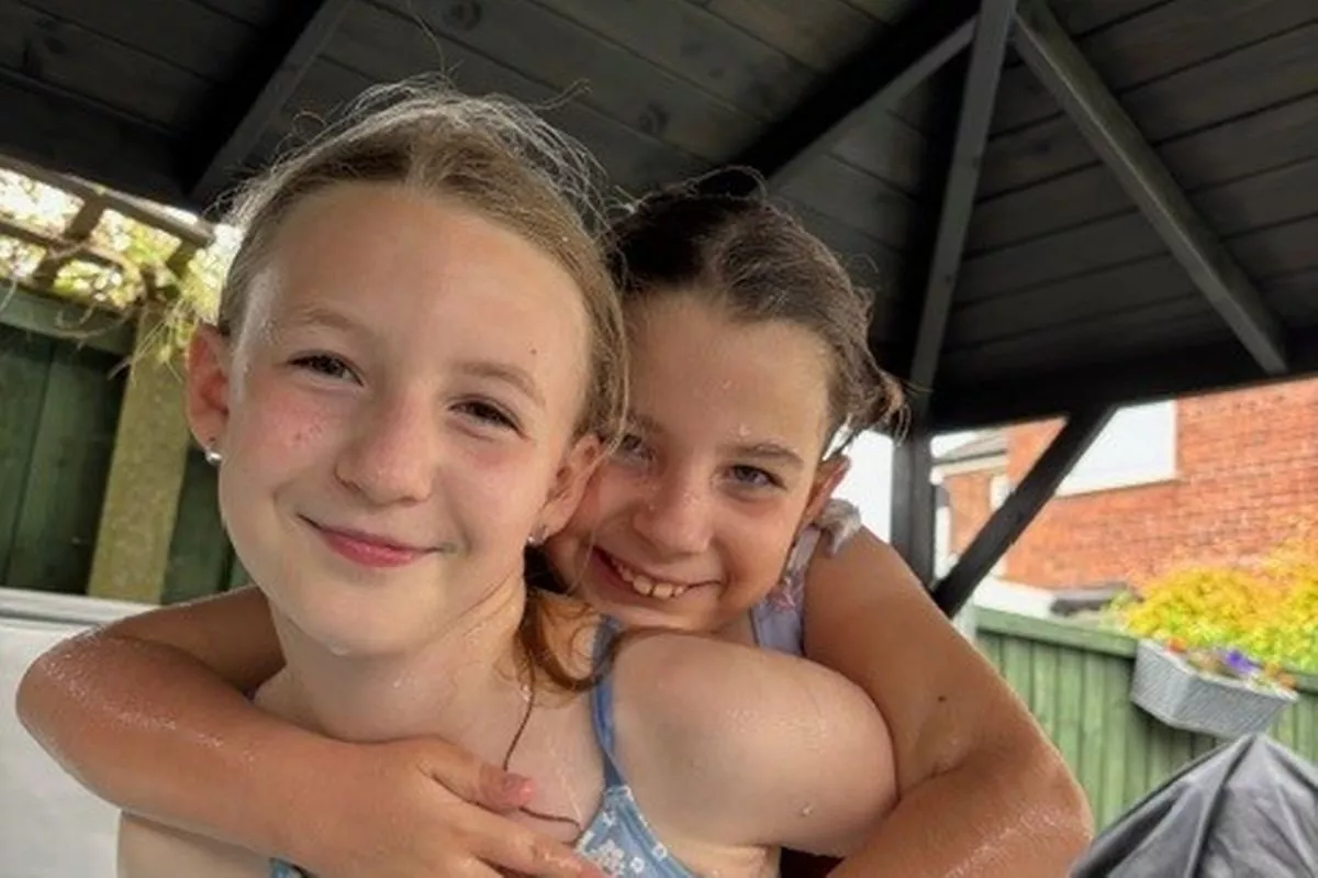 Sophie, who uses the children's hospice, with her big sister