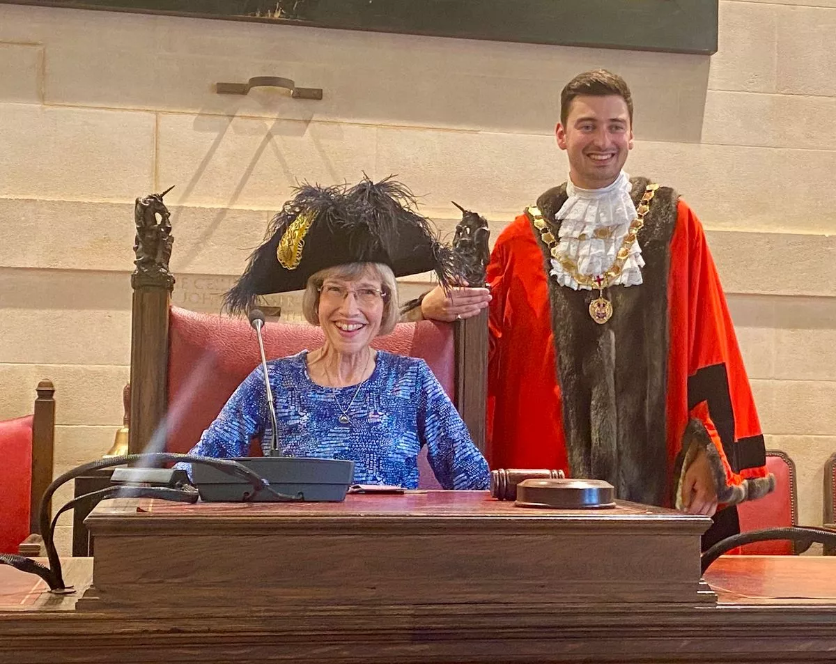 Karen Rich receiving a Lord Mayor's Medal from the Lord Mayor of Bristol, Cllr Henry Michallat, for her years of voluntary work litter-picking in Redcatch Park, Knowle