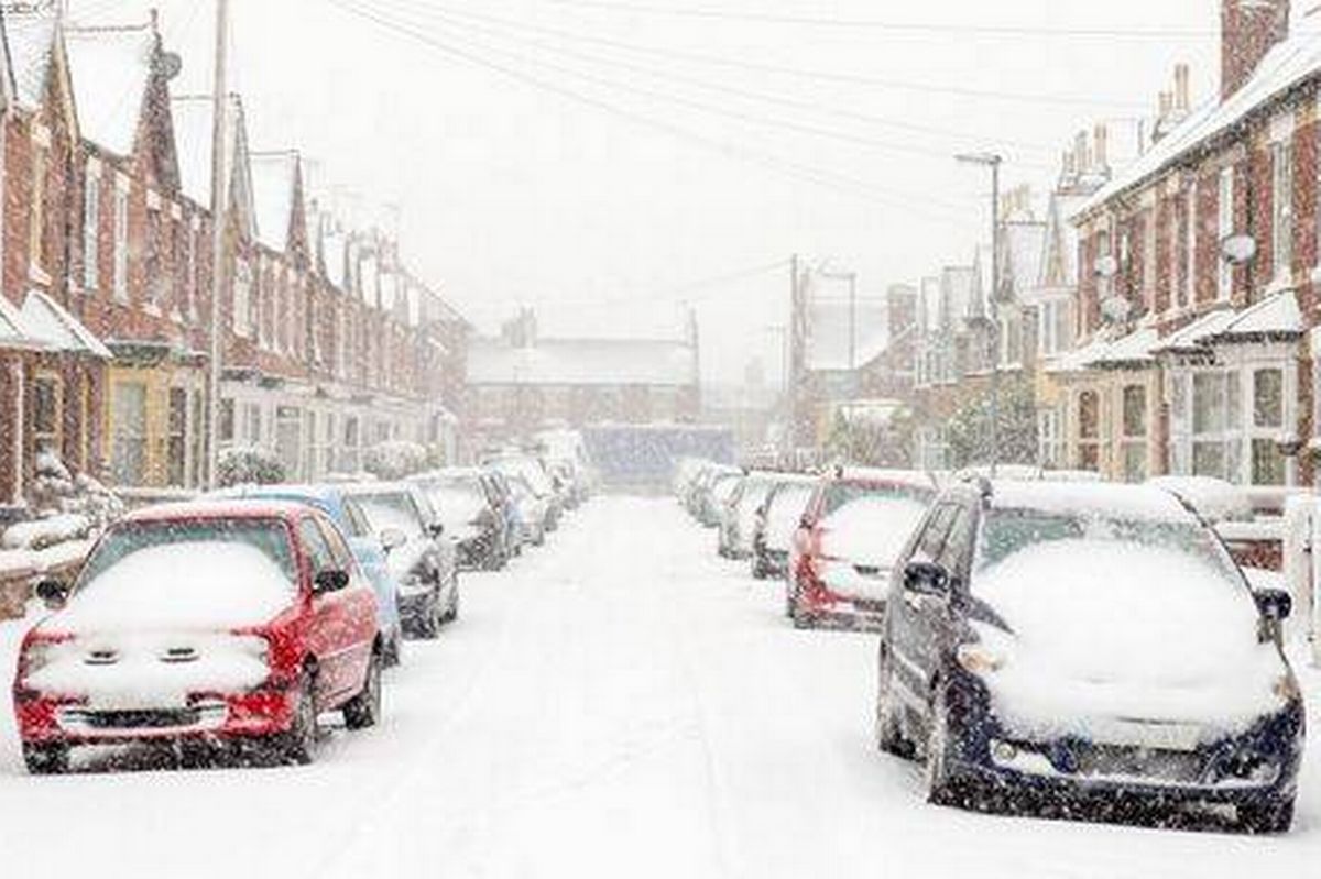 Typical UK street in winter snow