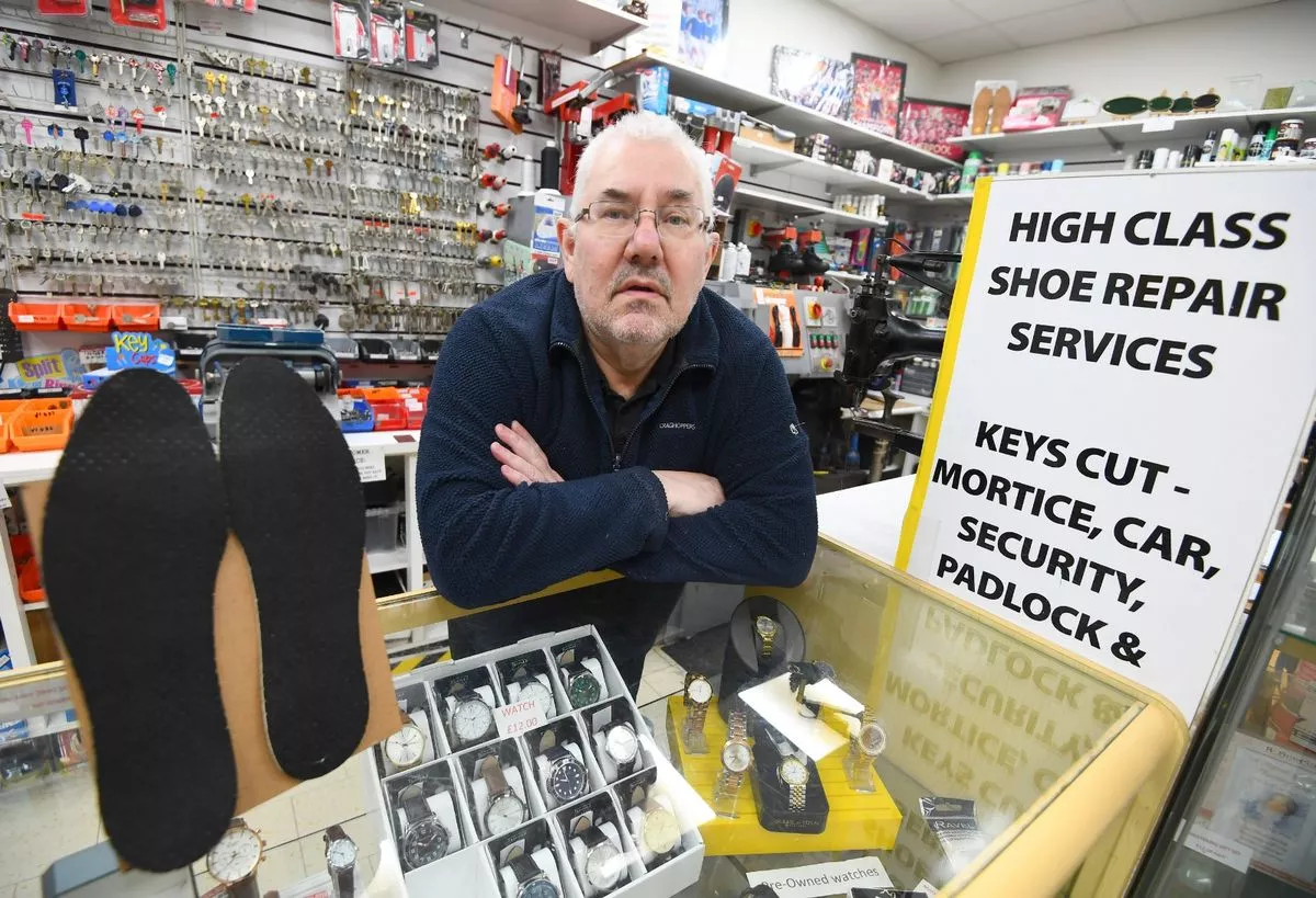 Mervin Garner inside the shoe repair shop he has run for 35 years