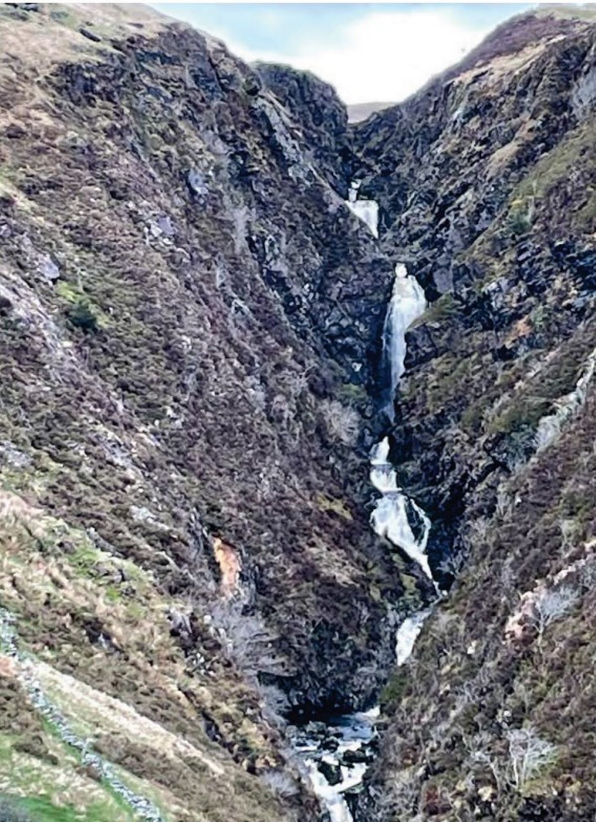 White water cascades down the waterfall at Cwm Cynfal