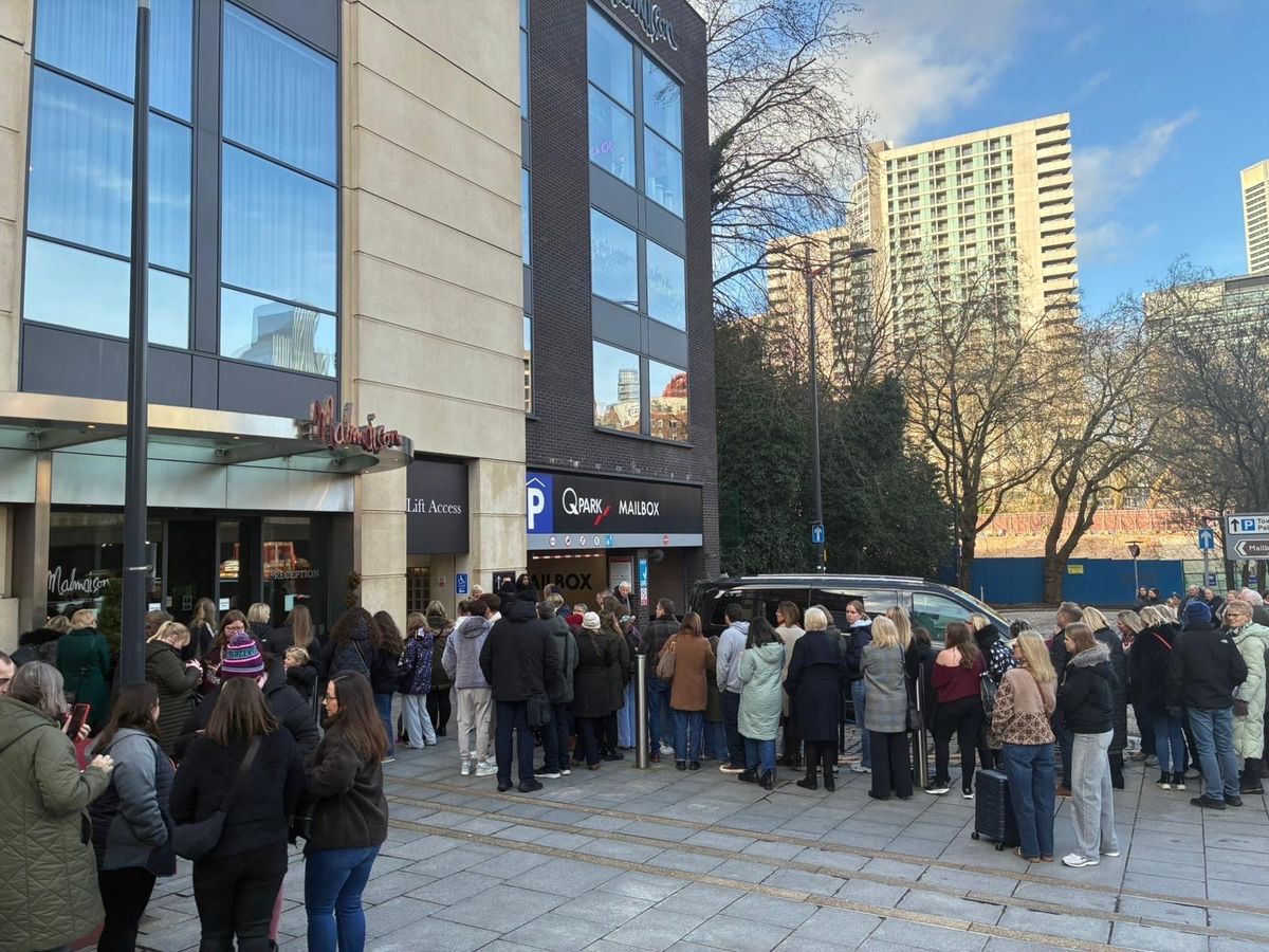 Crowds gather outside The Mailbox on the morning of January 24