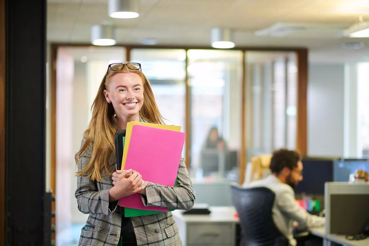 happy young office junior