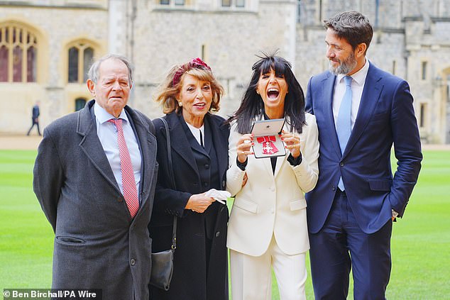 Claudia pictured with father Barry, mother Eve Pollard and husband Kris Thykier