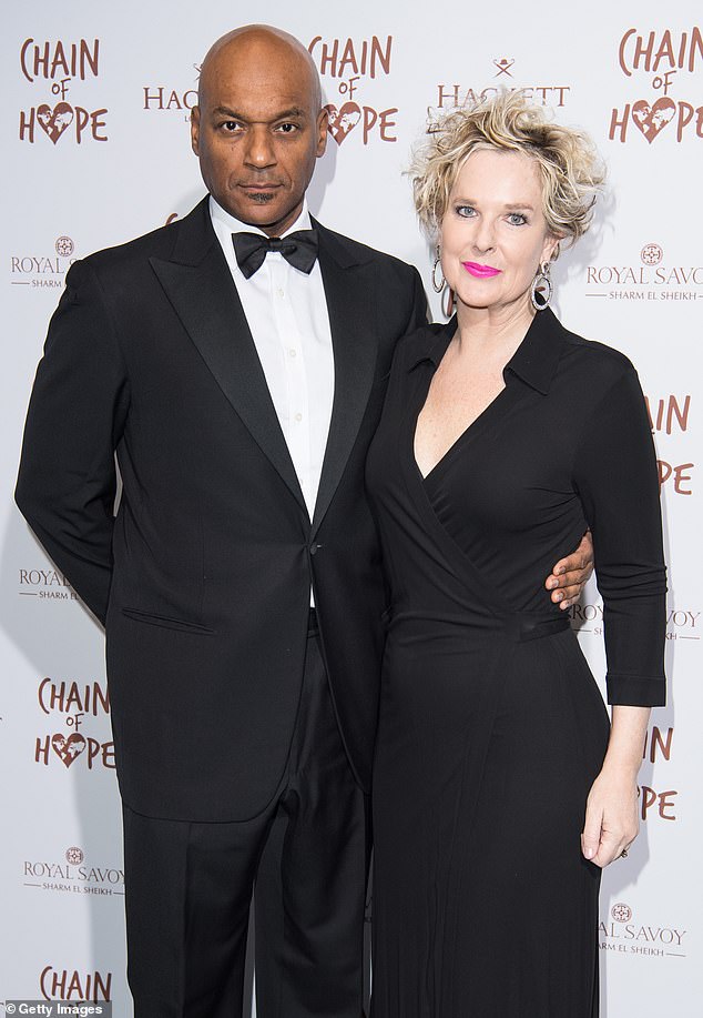 Salmon wept in court as he told of caring for his ill wife Fiona Hawthorne and their daughter Sasha - the couple are seen at the Chain Of Hope Gala Ball in London in November 2018