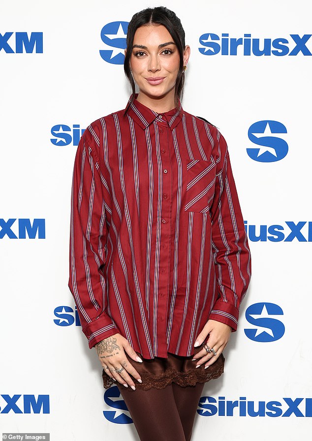 A long veil was placed at the back of her head and the bride - who has a resemblance to his ex Brianna Chickenfry LaPaglia- also carried a bouquet of white flowers in her hand; LaPaglia seen in October in NYC