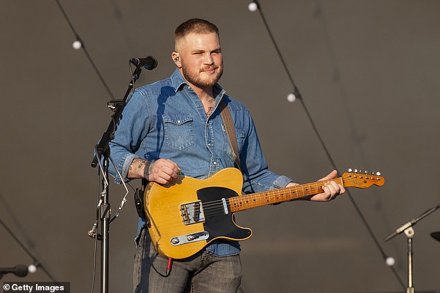 On Tuesday, the performer jumped to his main Instagram page to share a black and white image as he posed with a group of pals also dressed in suits - possibly hinting that they were his groomsmen; seen in June in London