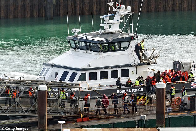 Migrants arriving in Dover after being rescued by a Border Force vessel in December