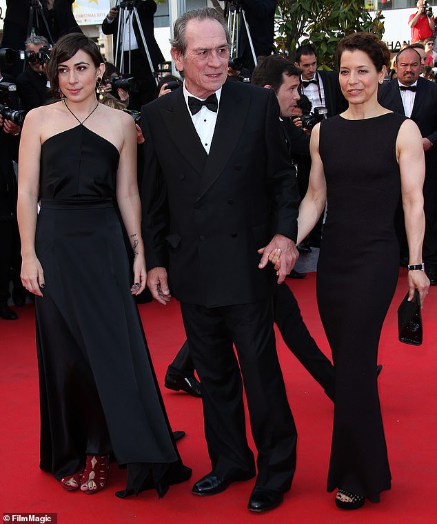 Jones is pictured with his third and current wife Dawn Laurel-Jones (right), as well as with Victoria, at the Cannes premiere of the 2014 movie The Homesman, which he directed