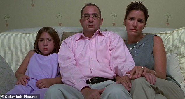 Victoria (left) is pictured with Barry Sonnenfeld (center) and Stephanie Kemp (right) in her movie debut Men in Black II, starring her father with Will Smith