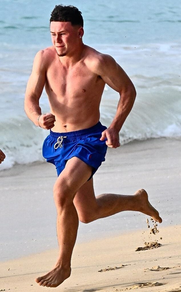 Wayne Rooney's lookalike son Kai showed he's following in his dad's footsteps as he took a break from Manchester United's under-18s for a family holiday to Barbados