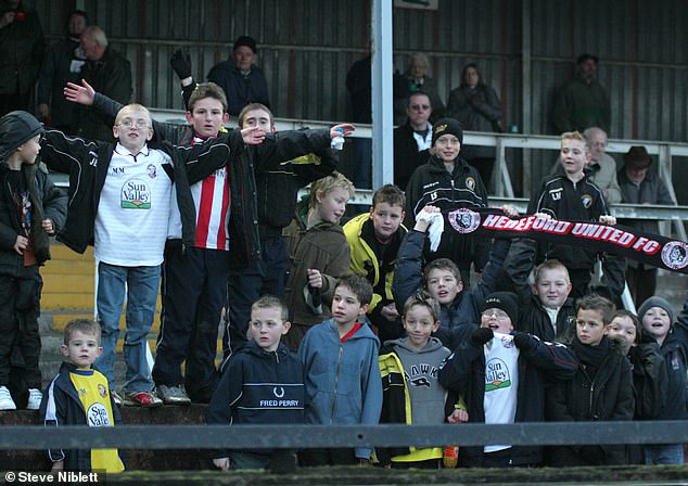 Bowen was keen to repay a club who gave him a shot having come up the leagues at Hereford United, who he supported (white shirt and glasses, left-hand side) as a boy