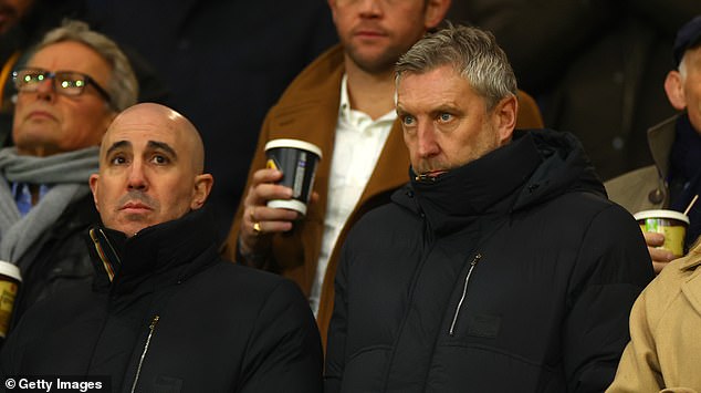 Chief executive Omar Berrada (left) and director of football Jason Wilcox look glum as they watch the Wolves draw. Wilcox's role is interesting as his dialogue with Amorim is continuous