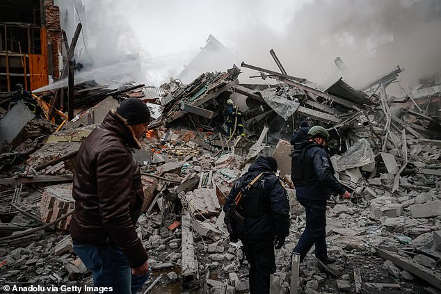 The Russian ballistic missiles destroyed a block of flats (pictured) in north-eastern Ukraine, killing two and injuring 28, according to the Kharkiv Regional Military Administration
