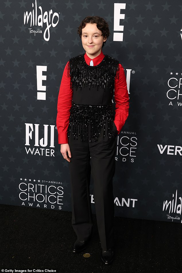 The Last of Us star Bella Ramsey, 22, sported a unique fringe vest and pants with a red shirt