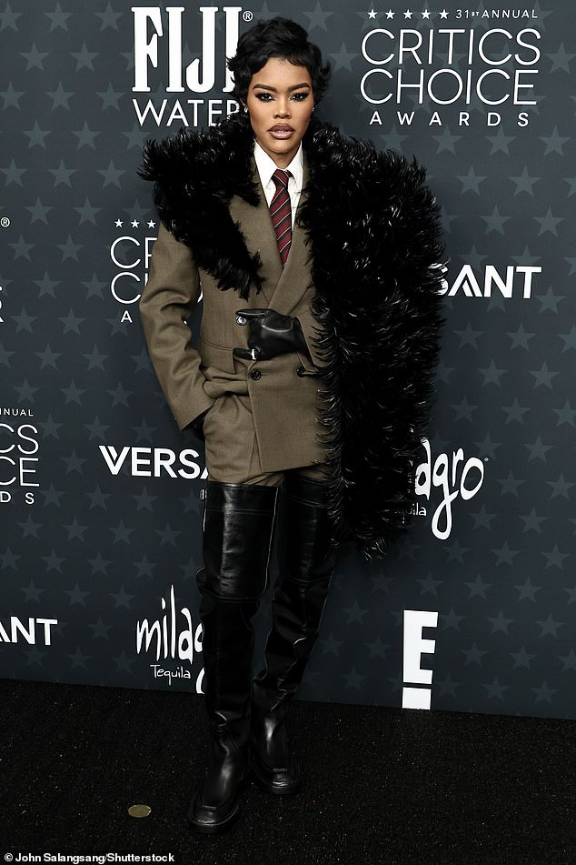 One Battle After Another star Teyana Taylor, 35, delivered high-fashion drama in an androgynous-inspired Saint Laurent look