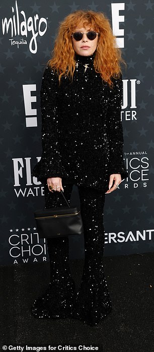 She accessorized with sunglasses