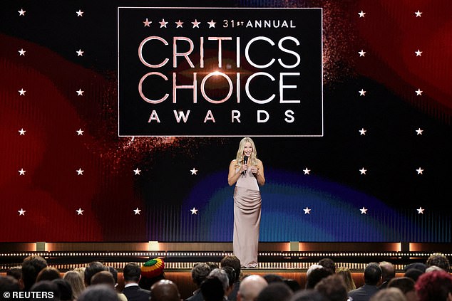 The Critics Choice Awards has come under fierce fire for the 'disrespectful' way it announced the 'lesser' awards. Host Chelsea Handler is seen on stage during the awards show