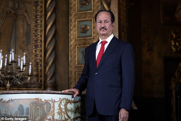 DAMAC Properties CEO Hussain Sajwani listens as U.S. President-elect Donald Trump speaks to members of the media during a press conference at the Mar-a-Lago Club on January 07, 2025