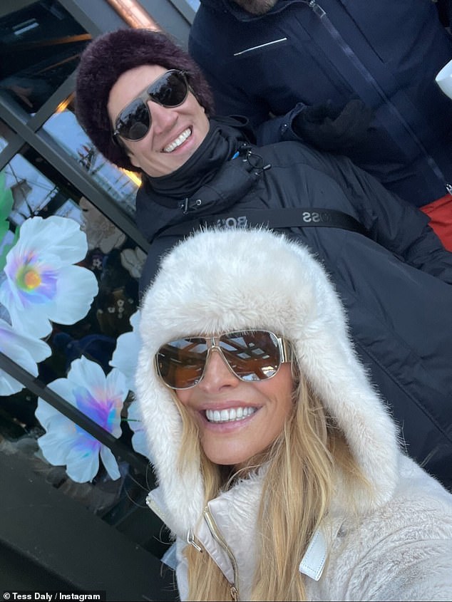 The former Strictly host wrapped up warm in a white woolly jacket and matching hat