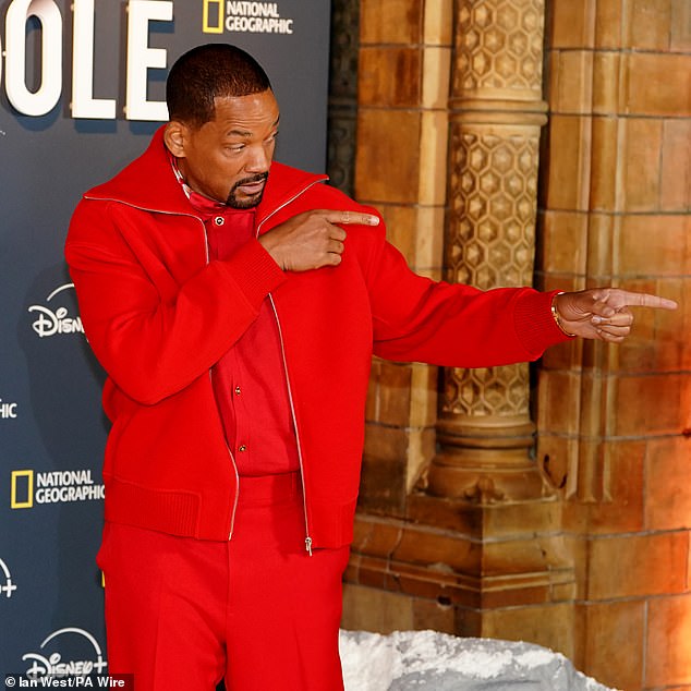 He wore a shirt and trousers which were layered with a sports jacket and teamed with a pair of contrasting brown dress shoes