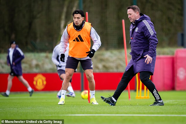 Steve Holland, Carrick's No 2, was also seen out on the training ground at Carrington