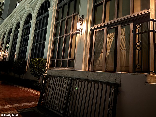 Normally guests in the main ballroom at The Breakers would look out directly on to a stunning ocean vista. Instead, the huge windows were blacked out to keep prying eyes away.