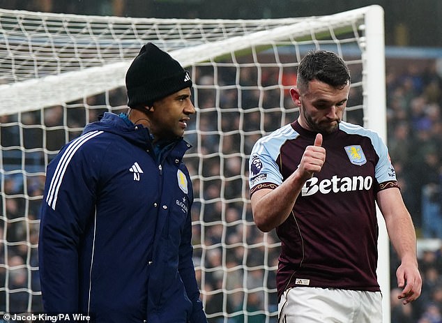McGinn gives the thumbs up as he leaves the field, and Scotland and Villa fans will be hoping he is okay
