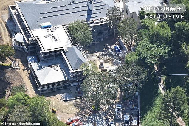 At least a dozen vehicles and scores of workers swarm the site daily as Adele's decade-long rebuild continues