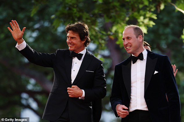 Prince William of Wales and actor Tom Cruise at the Top Gun: Maverick performance at the Odeon in Leicester Square on May 19, 2022
