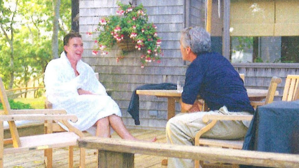 An image of Peter Mandelson in a white dressing gown laughing with Epstein was included in his 50th birthday book
