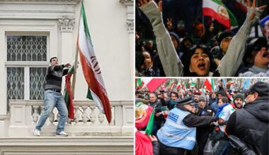 Protester scales Iranian Embassy in London, tears down regime flag, hoists pre-revolution symbol