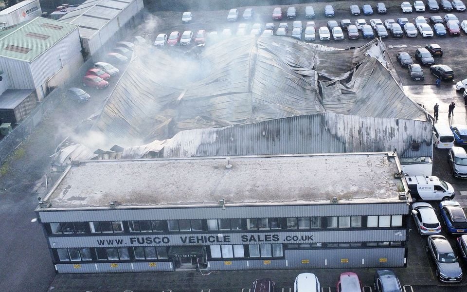 The scene at Fusco Vehicle Sales in Balloo Industrial Estate in Bangor, where a fire on Friday evening destroyed the dealership workshop.  Jonathan Porter/PressEye