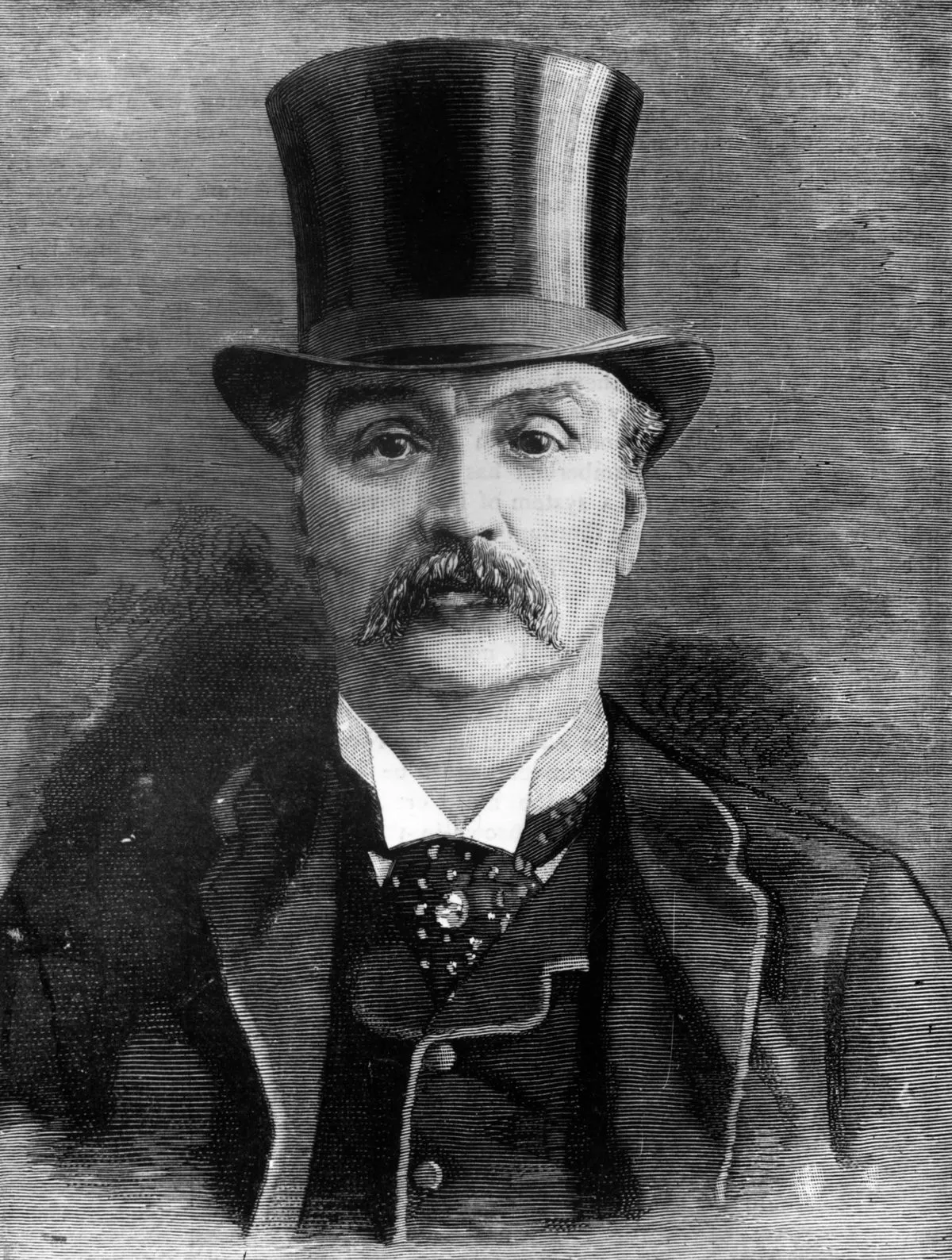 Black and white engraving of a man wearing a three piece suit, cravat and brooch. On his head is a top hat; he sports a drooping moustache and stares directly at the viewer.