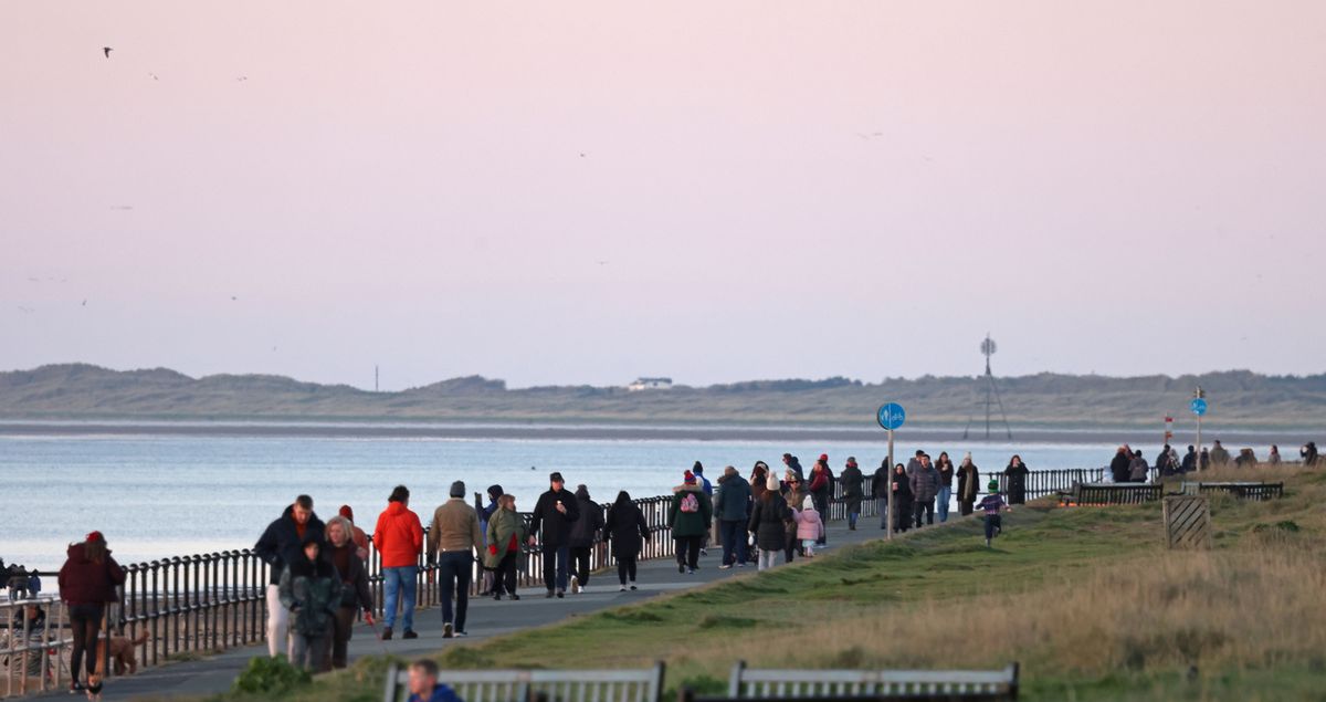 Crowds take to Crosby Beach on Boxing Day 