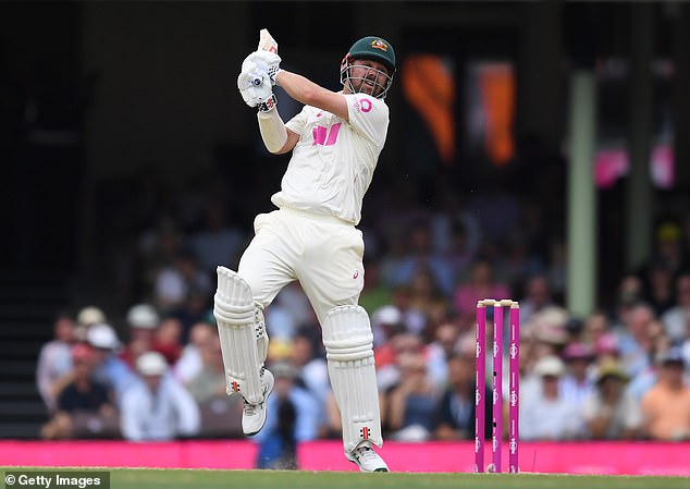 SYDNEY, AUSTRALIA - JANUARY 05: Travis Head of Australia hits out during day two of the Fifth Test in the 2025/26 Ashes Series between Australia and England at Sydney Cricket Ground on January 05, 2026 in Sydney, Australia. (Photo by Philip Brown/Getty Images)