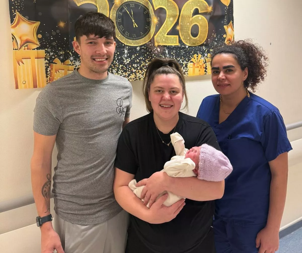 Proud Ryan and Katelyn with their New Year's Day arrival Maeve