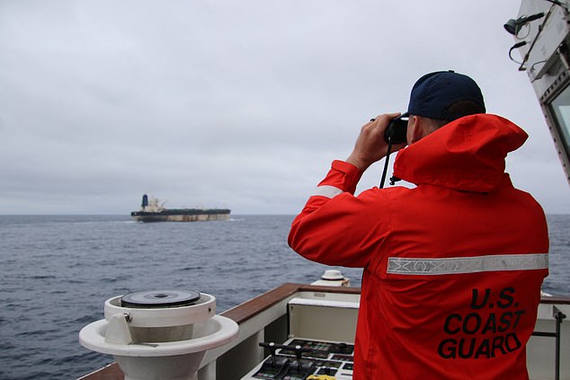 TOPSHOT - This undated handout photo released on January 7, 2026, by the US European Command's X account shows what US European Command says is the seizure of the M/V Bella 1 oil tanker in the northern Atlantic Ocean. The United States military on January 7, 2026, announced the seizure of a Russian-flagged oil tanker in the North Atlantic for sanctions violations, bringing an end to a multi-week pursuit by American forces. The seizure of the ship, which evaded being boarded near Venezuela, was a joint operation between the Department of Homeland Security and US military personnel, the US European Command, which is responsible for the region, said in a post on X. (Photo by HANDOUT / US European Command / AFP via Getty Images) / RESTRICTED TO EDITORIAL USE - MANDATORY CREDIT "AFP PHOTO /  US EUROPEAN COMMAND / HANDOUT" - HANDOUT - NO MARKETING NO ADVERTISING CAMPAIGNS - DISTRIBUTED AS A SERVICE TO CLIENTS