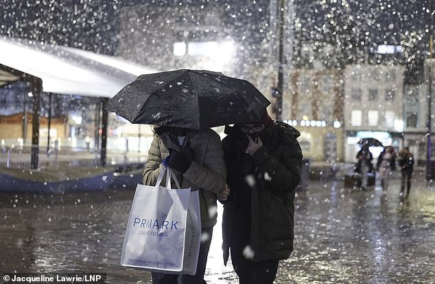 Â© Licensed to London News Pictures. 08/01/2026. Northampton, UK. People walk in the snow in Northampton, Northamptonshire as storm Goretti hits the UK. The Met Office has issued Yellow and Amber alerts for much of the country. Photo credit: Jacqueline Lawrie/LNP