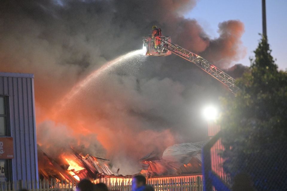 Fire crews tackling an ongoing Bangor fire at Balloo Road industrial estate. Pacemaker