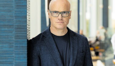 An elegant dining setting at a classic London restaurant, showcasing fine tableware and a warm, inviting ambiance.