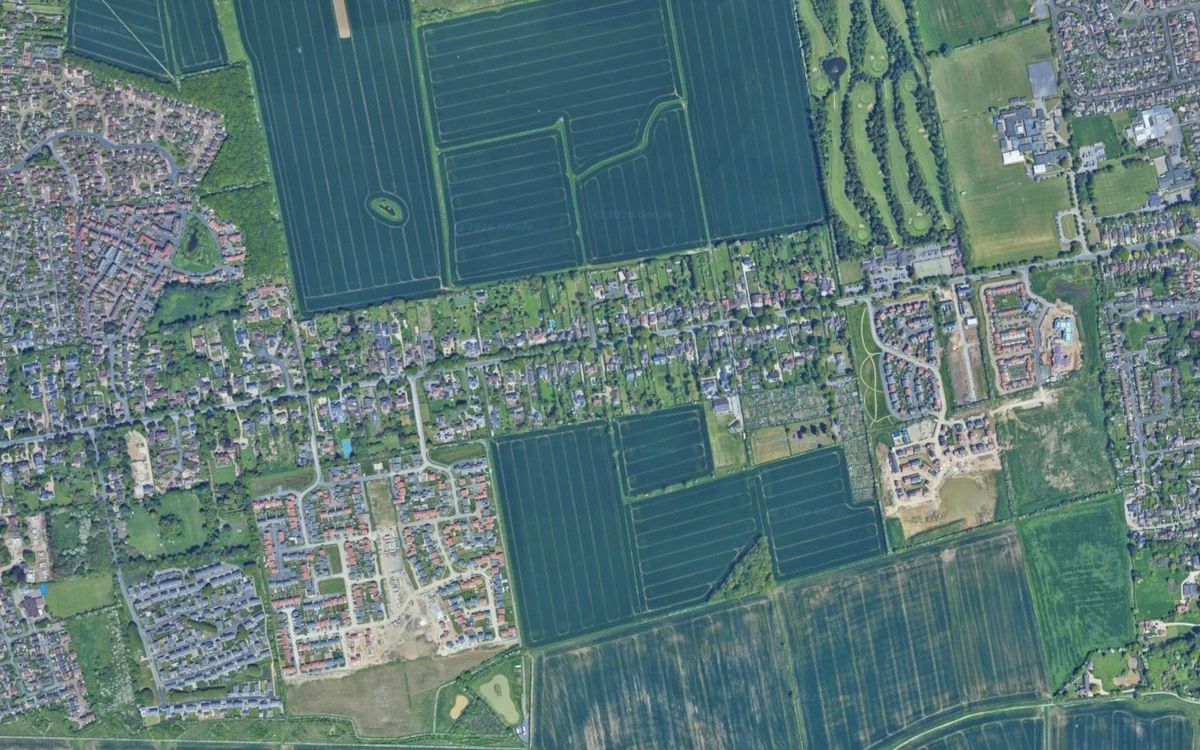 Another wider aerial view of the Humberston Country Club golf course; a par three golf course used to exist around 15 years ago where housing is in the bottom left of the image