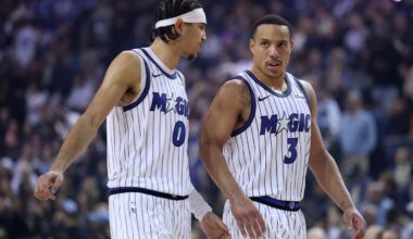 GettyImages 2256933277 showing a professional business meeting with diverse team members discussing strategy in a modern o...