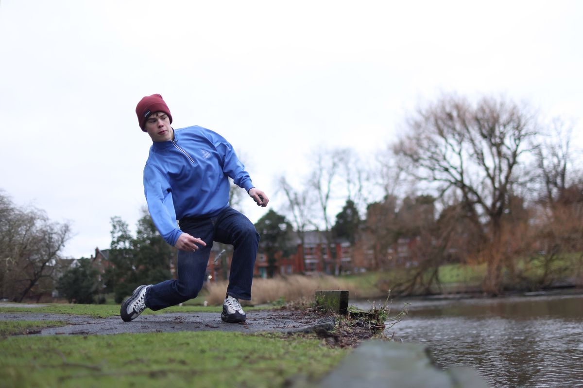 Joel Lewis from Liverpool Stone Skimming Society in action in Greenbank Park